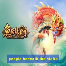 people beneath the stairs