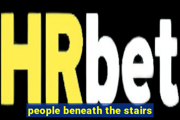 people beneath the stairs