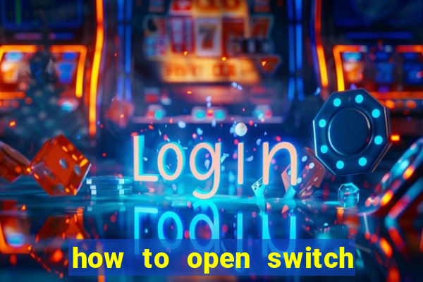 how to open switch oled game card slot