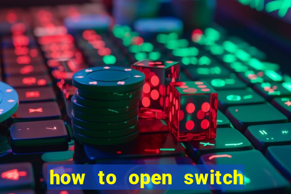 how to open switch oled game card slot